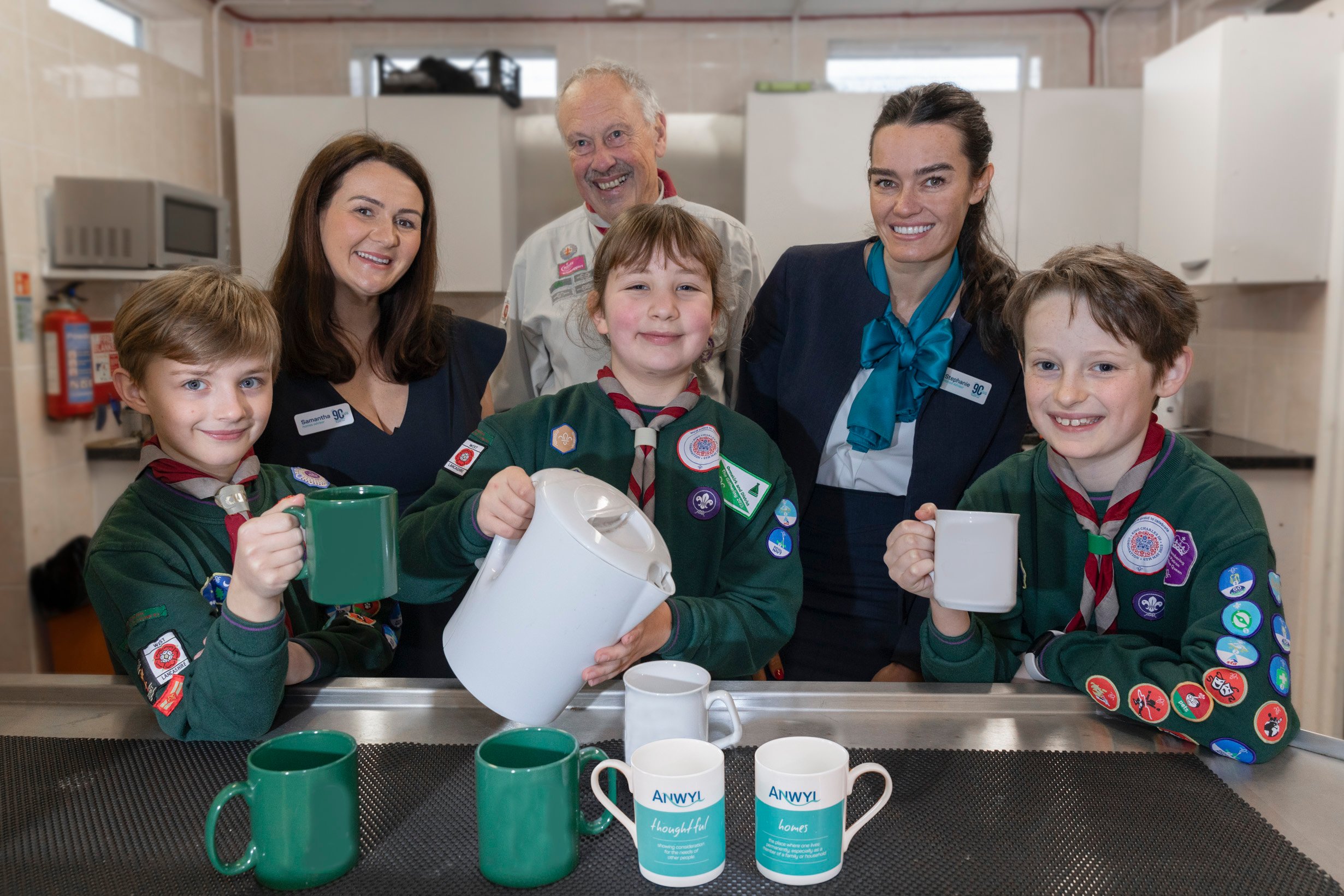 1.	Anwyl’s Samantha France and Stephanie Tam visit 29th Ormskirk Burscough St Johns Scout Group to see how Love From Anwyl funding has been used. They’re pictured with Group chairman Chris Nevill, Eleanor, Benjamin, Isobelle and Elliott.