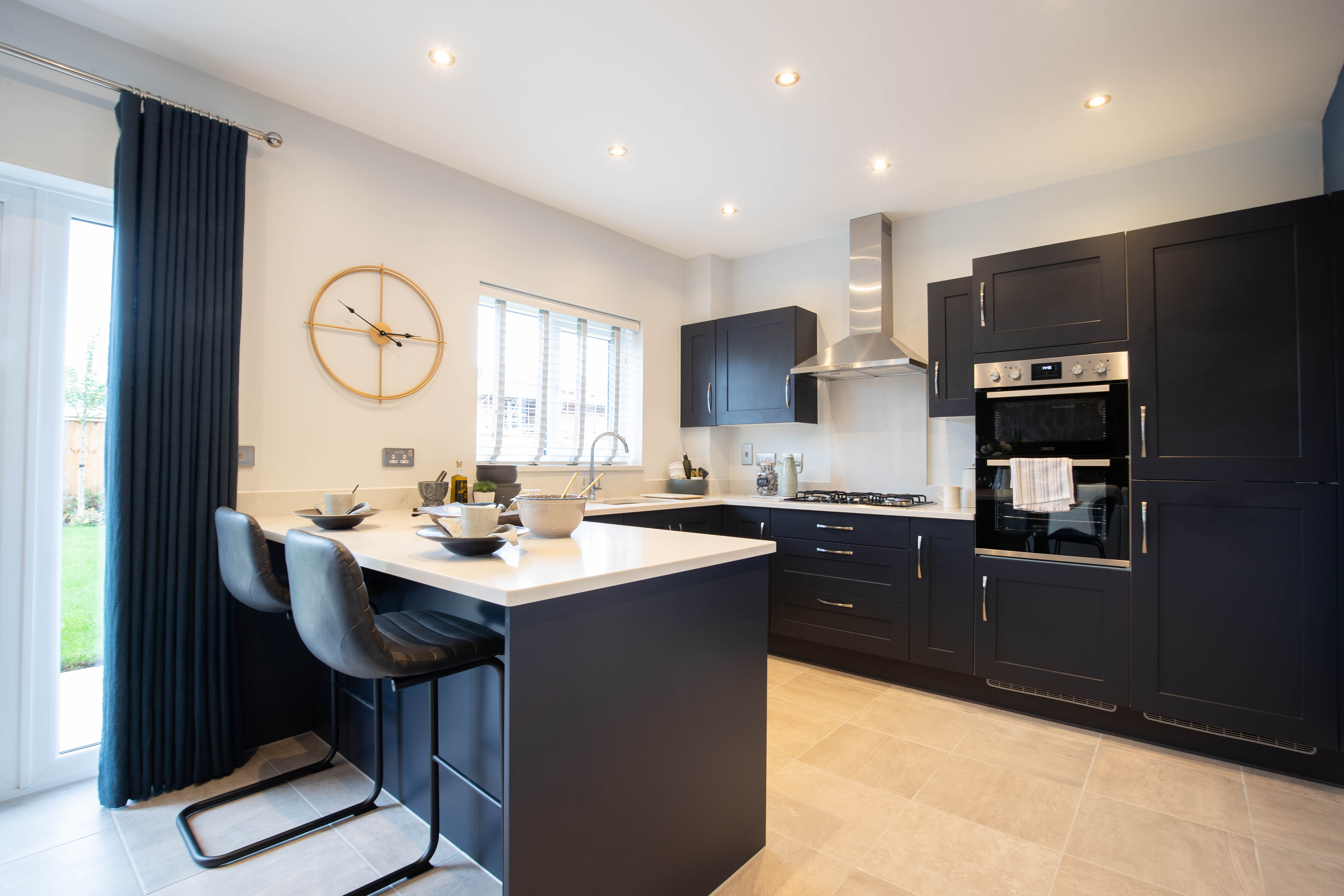 The stylish kitchen in the Oakmere show home at Stonebridge Fold, Longridge