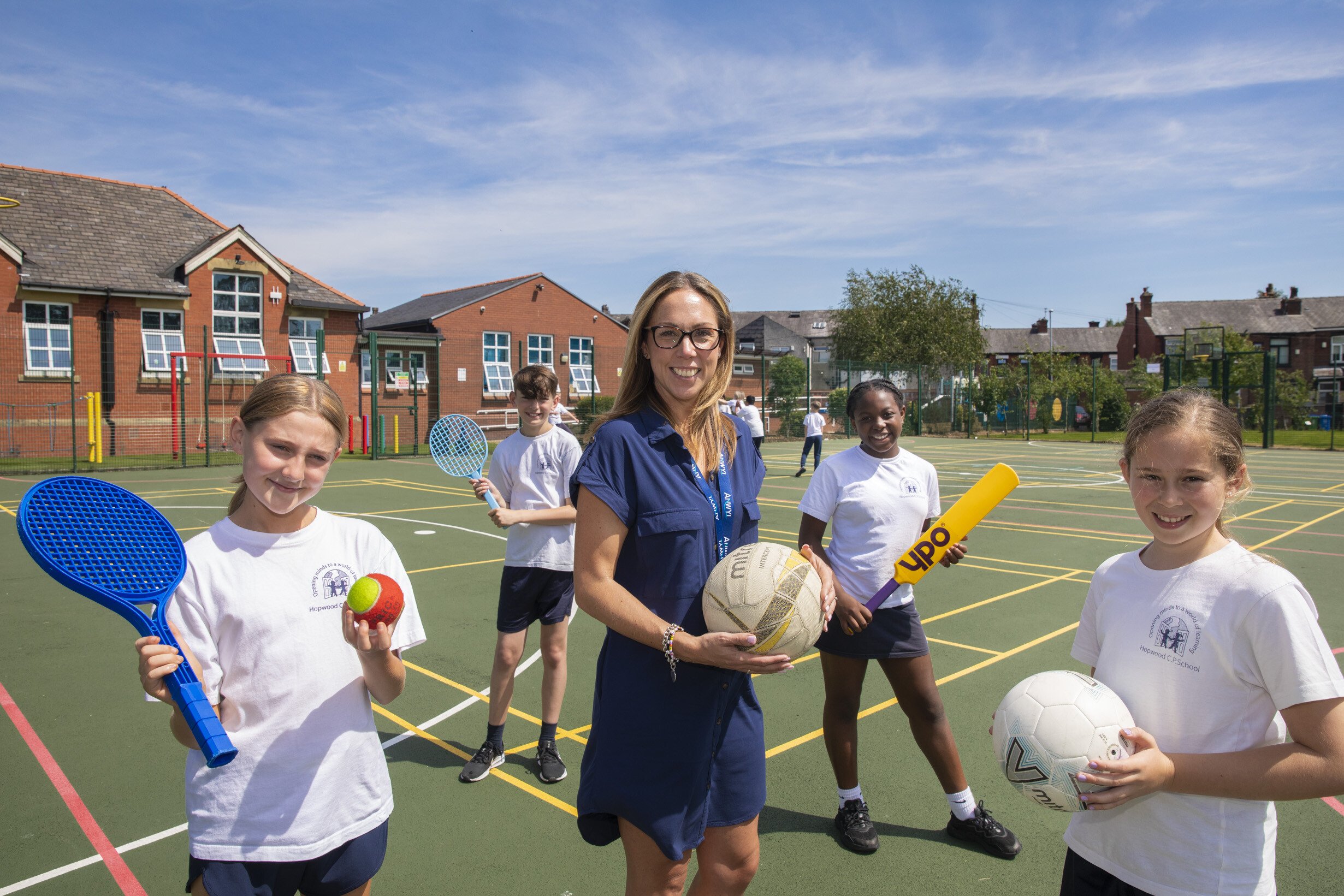 1.	Anwyl funding has helped Hopwood Primary School improve a multi-use games area. Anwyl area sales manager Amy Houlihan is pictured with pupils Summer, Bobby, Ese and Grace